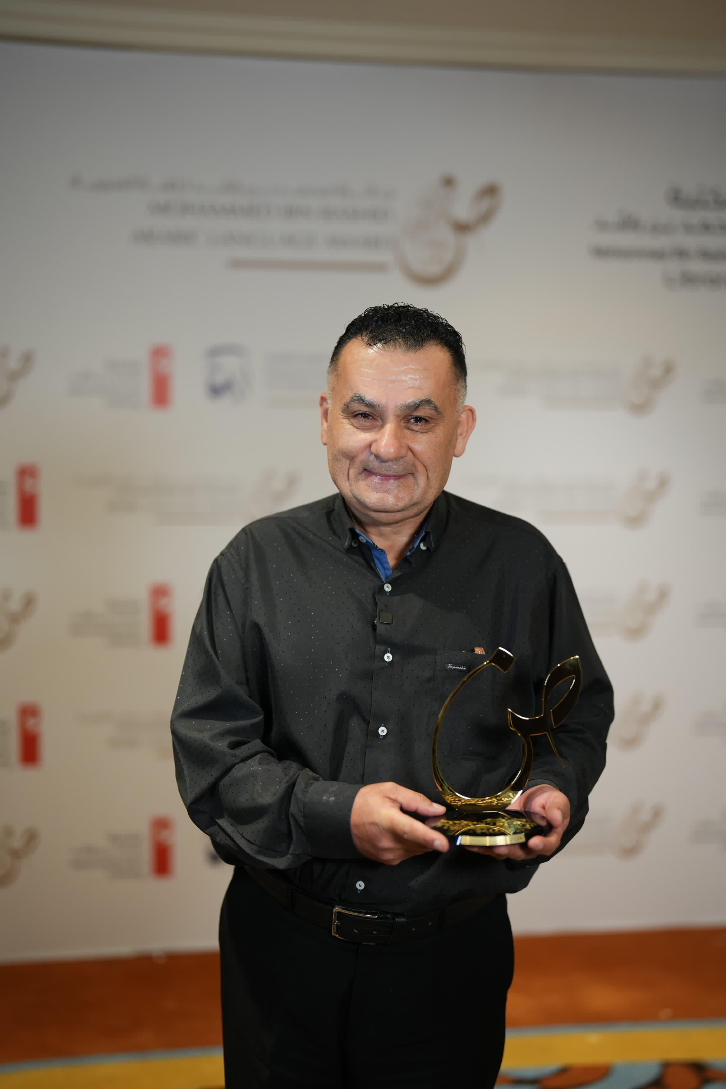 His Highness Sheikh Muhammad bin Rashid Al Maktoum presenting the cultural award